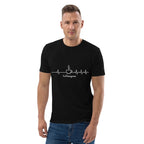 Man wearing a black organic cotton T-shirt with white Coffeeagram heartbeat artwork